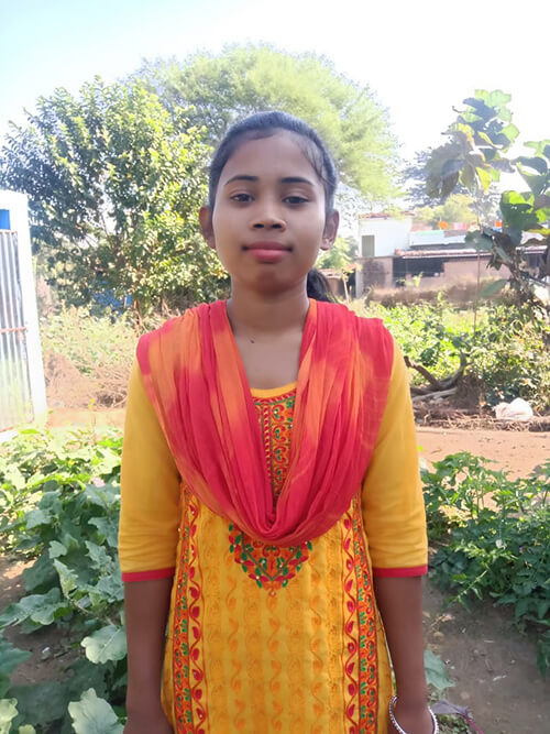 Jyoti, in her ChildFund-supported backyard nutrition garden